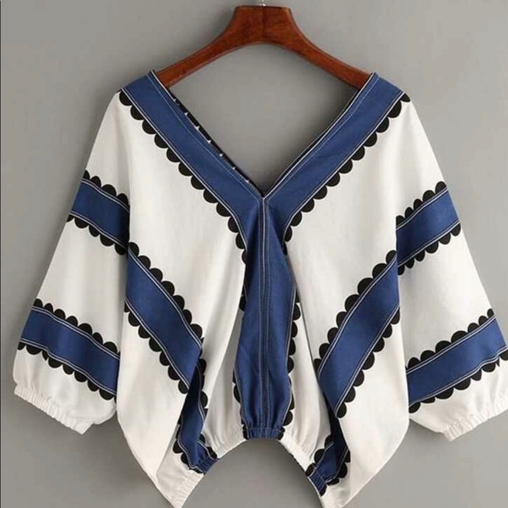 Sassy top- so cute with a denim skirt or white